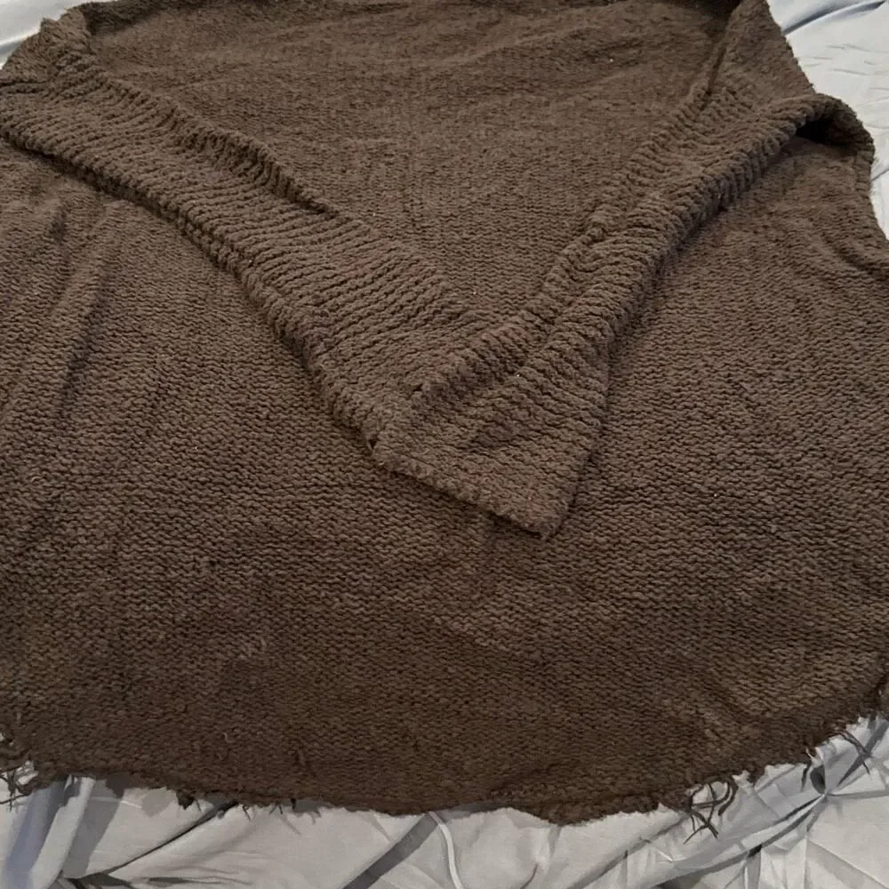 Free people, black sweater, distressed, looking size large